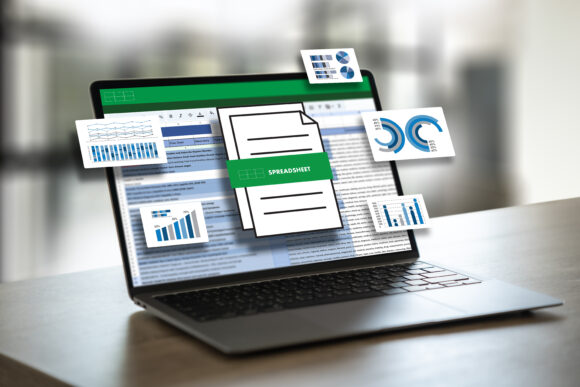 businessman working with data and graphs in spreadsheet documents for online analysis Microsoft Excel project dashboard accounting digital